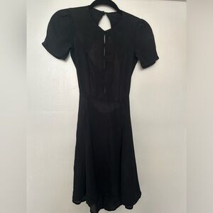 Reformation hollow design front and backless black dress Sz 2